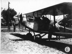 August Sam Huck barnstorming in his "Jenny" over an unidentified location in Sonoma County in the early 1930s