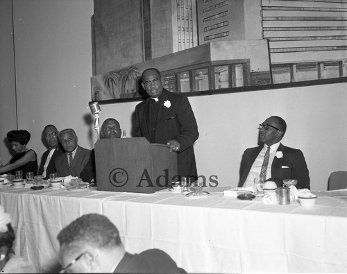 Minister at podium, Los Angeles, 1964
