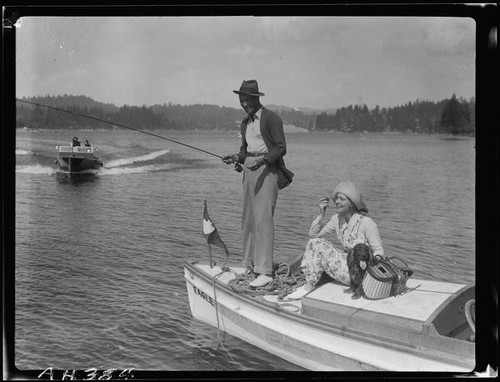 Actors Rod La Rocque and Vilma Banky fishing, Lake Arrowhead, 1929