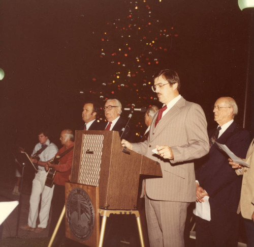 Carol singing at tree lighting ceremony, 1980