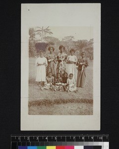 Group portrait of girls with dolls, Kumasi, Ghana, ca. 1910