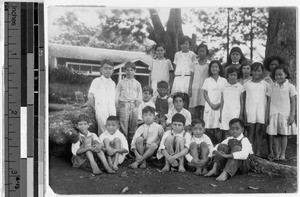 Sister Pieta Kirby, MM, with her sixth grade students, Heeia, Hawaii, 1929