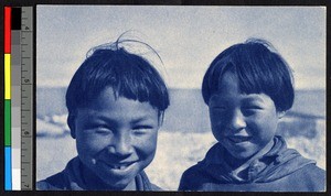 Two young boys standing outdoors, Canada, ca.1920-1940