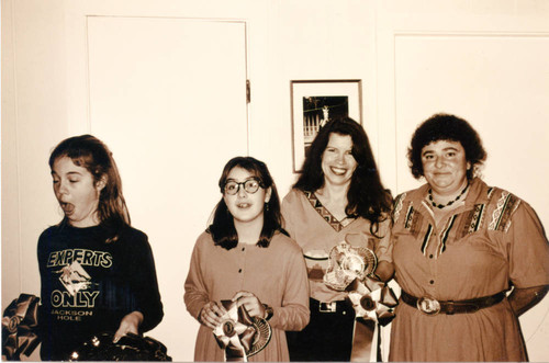 Emily, Donna Baversfeld, and Bonnie Decker receive riding awards, 1990s