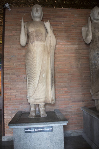 Standing Konnāgama Buddha statue