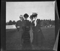 H. H. West poses with the Bendixon sisters and another girl possibly in Lincoln (Eastlake) Park, Los Angeles, about 1900