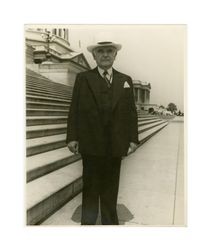Isidore B. Dockweiler in front of the United States Capitol Building, circa 1940