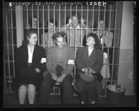Women pickets seated in jail after being arrested during film studio strike in Los Angeles, Calif., 1946