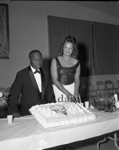 Cutting cake, Los Angeles, 1963