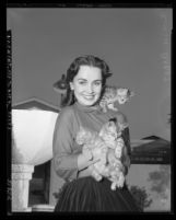 Actress Susan Cabot with three kittens, circa 1950