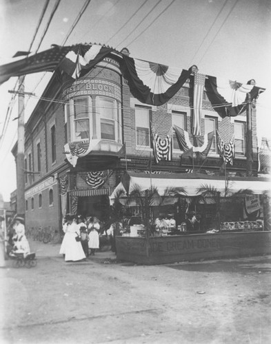 1910 Street Fair, booths in front of Campbell Building and Dittmer's Mission Pharmacy, Orange, California