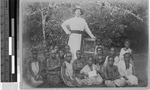 Priest with a group of children, Uganda, Africa, April 30, 1909