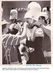 Capuchino Band Member Preparing for Posy Parade, June 3, 1990