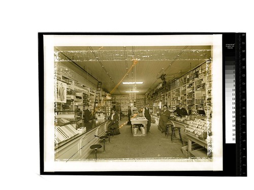 [Workers and customers in Seely and Titlow dry goods store]