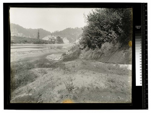 [River bed with Scotia Bluffs and railroad tracks in the