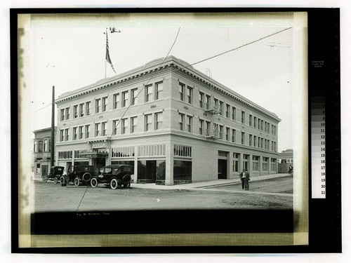 [Hotel Arcata , with autos on unpaved Streets]