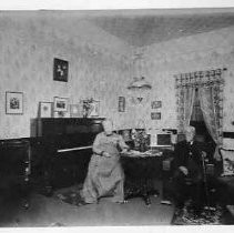 Mr. and Mrs. William Siebert at home above present Post Office, Columbia, Calif., about 1900