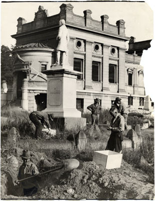 [Workmen removing graves from a cemetery]