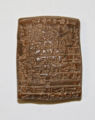 Cuneiform inscriptions on clay tablet