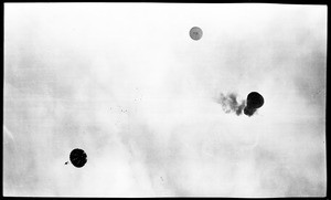 Two parachutists dropping from a balloon at the Dominguez Hills Air Meet, 1910