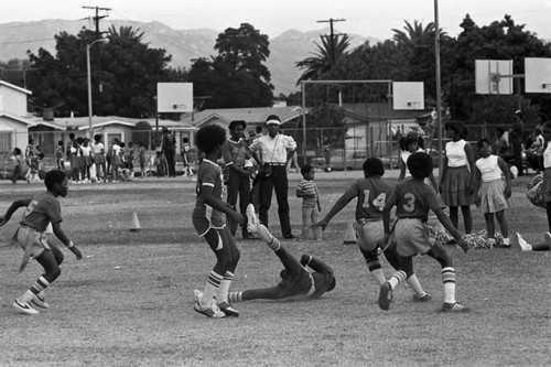 Bethume Jr. High School students playing ball, Los Angeles, 1982
