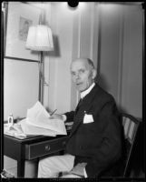 General George Owen Squier, seated at desk, [Los Angeles?], 1932