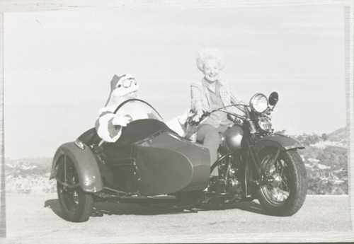 Katherine Hoffman and Santa Claus on a Motorcycle