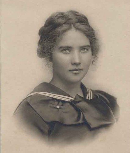 Portrait of girl in dress with sailor collar