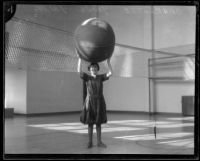 Charlotte Young plays cage ball at the Y.W.C.A., Los Angeles, 1926