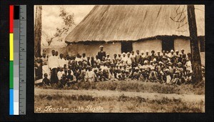 Indigenous teacher and assembled pupils, Angola, ca.1920-1940