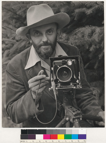Ansel Adams [with camera]