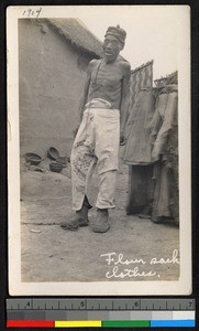 Man wearing pants made out of a flour sack, China, ca.1905-1910