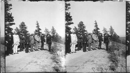 Left to right: D.A. Scott, Henry Ludley of Seattle Pres. of Columbia Basin League, Speaker Gillette Speaker of House, Sec'y Wallace of Agriculture, Sec'y Work of Interior Dept., Pres. Harding and Ivan E. Goodner Chief of Engineering of Columbia Basin project showing Pres. where proposed dam is to be built. Oregon
