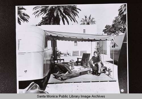Couple on the patio of their trailer home in Santa Monica, part of the Douglas Aircraft Company employee housing during World War II