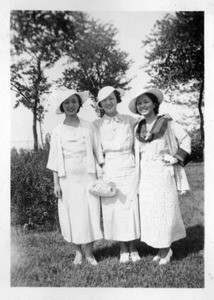 Frances Hur and 2 other women, all in white