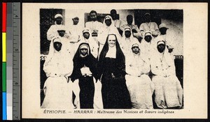 Missionary sister poses with an indigenous nun and novices, Harer, Ethiopia, ca.1900-1930