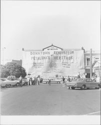 Downtown renovation of Petaluma's heritage, sign covering McNear Building