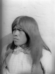 Portrait of a young Mojave Indian man who graduated from school, ca.1900