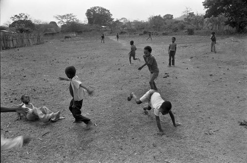 Boys playing in a dirt field, San Basilio de Palenque, 1977