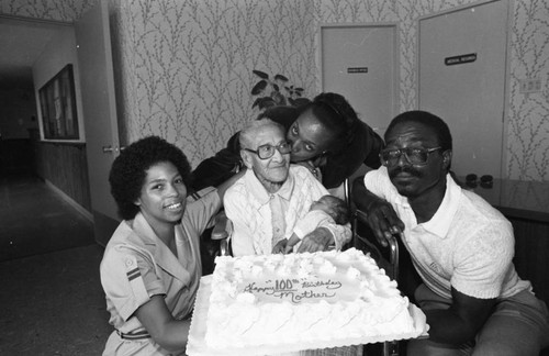 Mamie Smoot celebrating her 100th birthday with family, Los Angeles, 1983