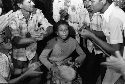 Boy playing the conga drum, Barranquilla, Colombia, 1977