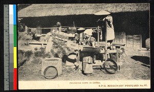 Pounding corn, Korea, ca.1920-1940