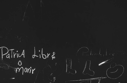 Writing on a black background, Nicaragua, 1979