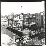 View of construction of the Parkway Theater in Oakland, California, looking west onto Park Boulevard