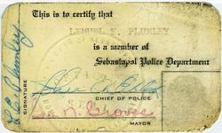 Sebastopol Police Officer Lemual "Shorty" Plumley's ID card signed by Chief of Police John Ellis and Mayor George N. Groves with Plumley's fingerprint