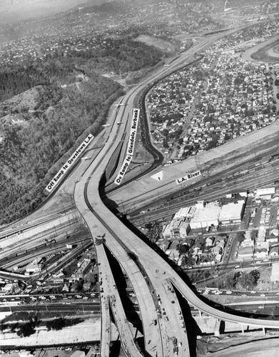 Freeway crosses L.A. River, aerial view