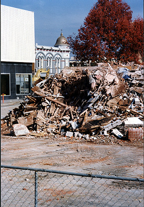 Leonard Building behind a pile of debris