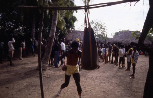 Boxer working out on punching bag, San Basilio de Palenque, 1976