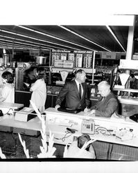 Mayor Gerald Poznanovich and unidentified K-Mart staff at the store's grand opening, Santa Rosa, California, February 24-27, 1970