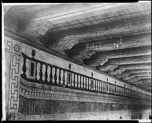 View of ceiling rafters and a painted wall at the Mission San Miguel Arcangel, ca.1900